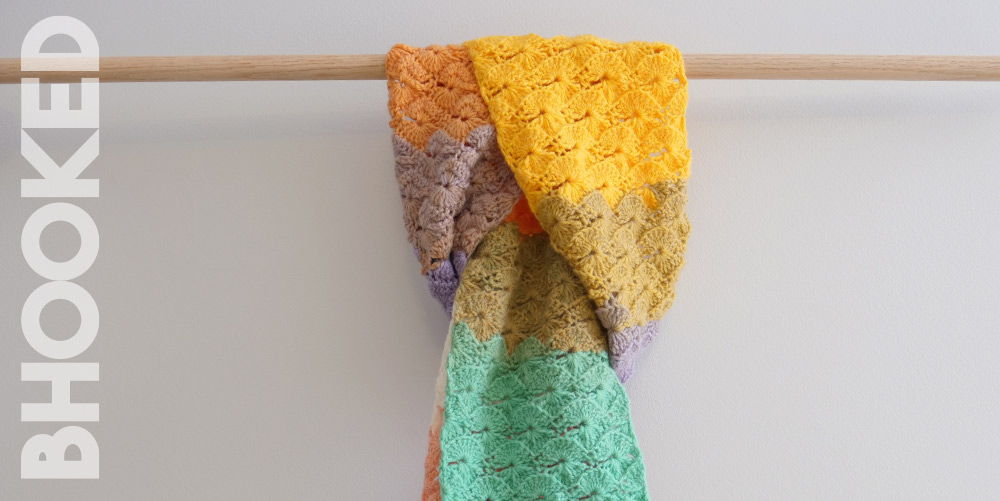 Crochet scarf made with Lion brand Mandala yarn and the Catherine wheel stitch.