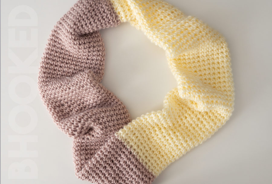 Pink and cream infinity scarf made with one of the best yarn for scarves - red heart super saver brushed.
