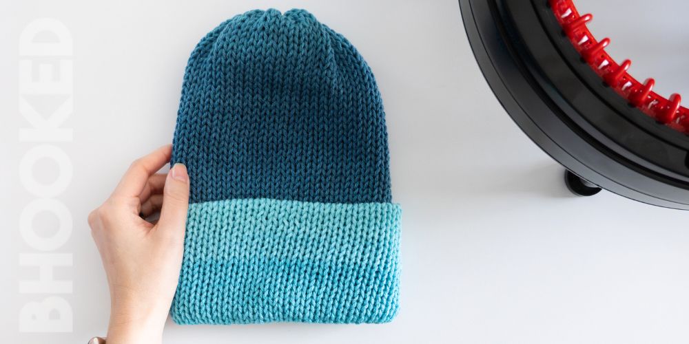 Hat knitting machine with blue hat